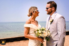 In Lake Tahoe, California, the newlyweds stand under the blazing sun rocking their sunglasses.